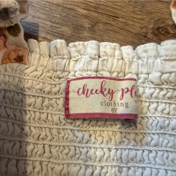 Cheeky Plum Floral Kids 3/4 puff sleeve dress- Floral with wooden buttons - Picture 3 of 3